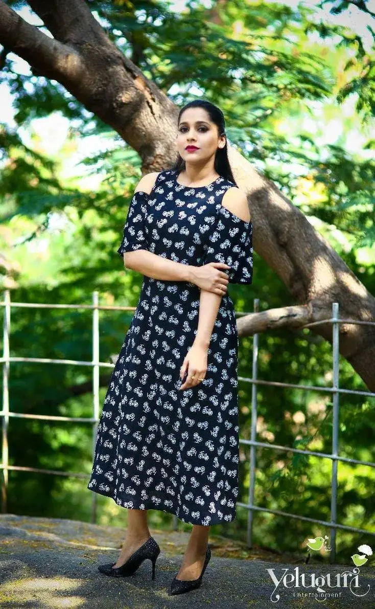 Indian TV Anchor Rashmi Gautam Stills In Black Dress